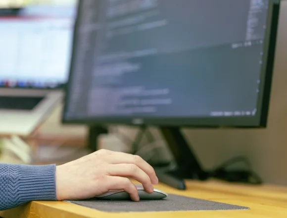 Hand using mouse